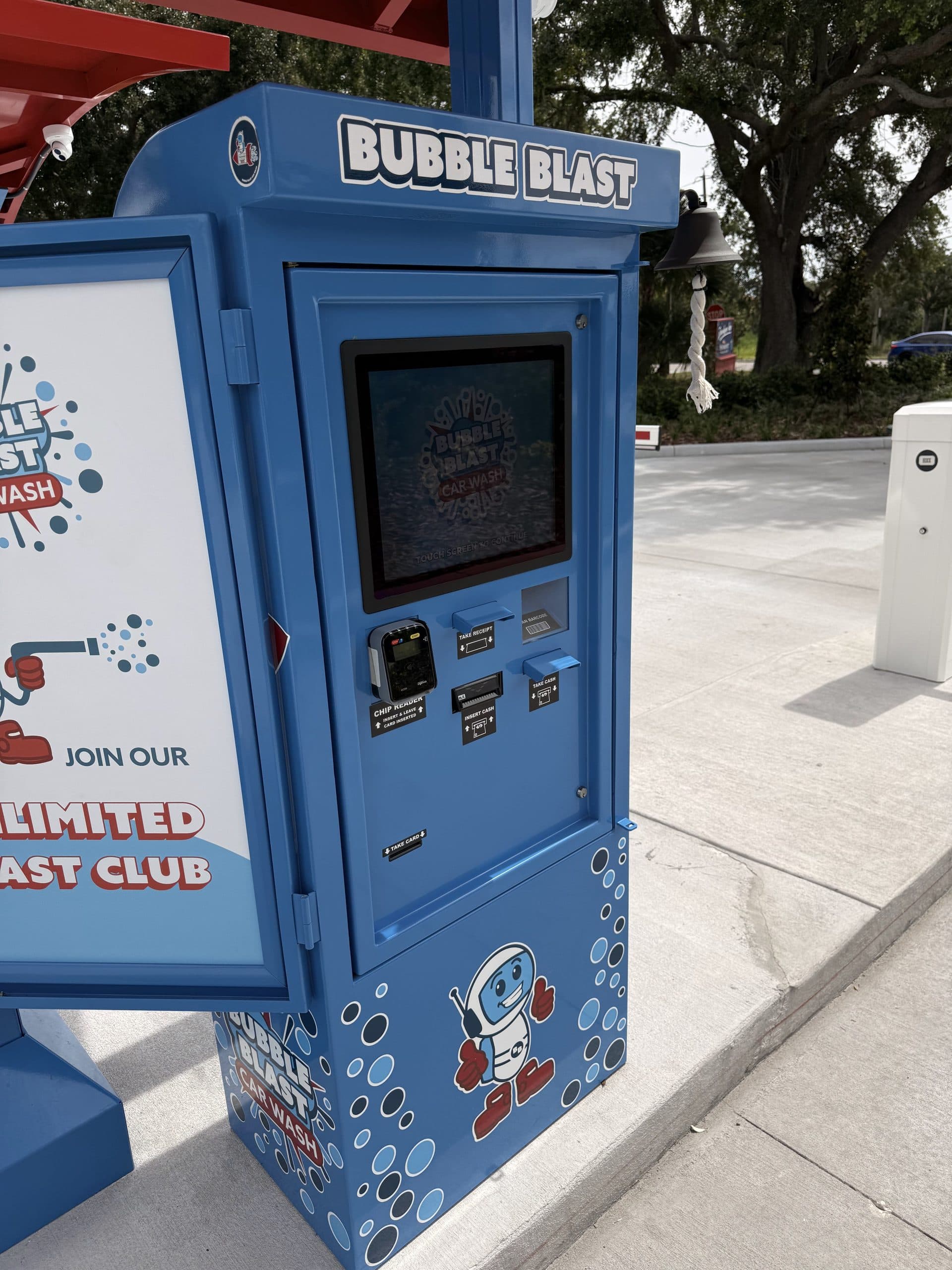 The Bubble Blast pay kiosk advertising the Unlimited Blast Club